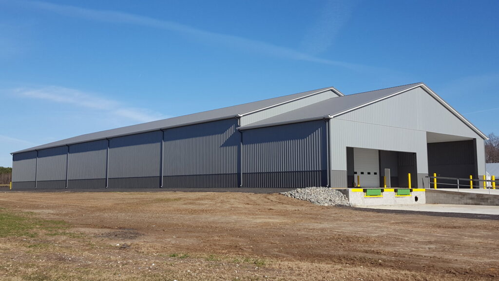 A newly installed commercial loading dock overhead door by Hickman Overhead Door in Milford, DE.