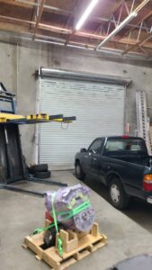 An interior view of a commercial rolling garage door, serviced by USA Doors in Doral, FL.