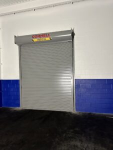 A commercial rolling steel garage door installed in a facility by ABC Garage Doors KC in Kansas City, KS.