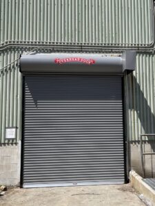A commercial rolling steel door with the Overhead Door logo, installed by Overhead Door Company of Little Rock in North Little Rock, AR.