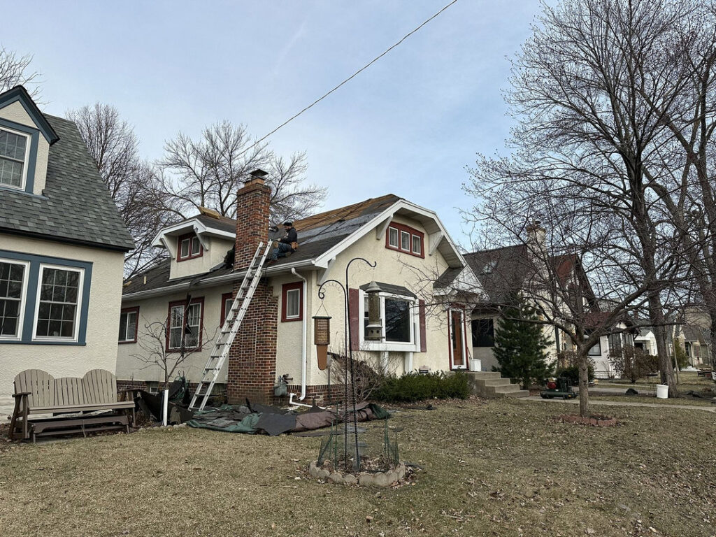 A beautifully completed siding and roofing project by Shelter Construction LLC, enhancing a home in Brooklyn Park, MN.