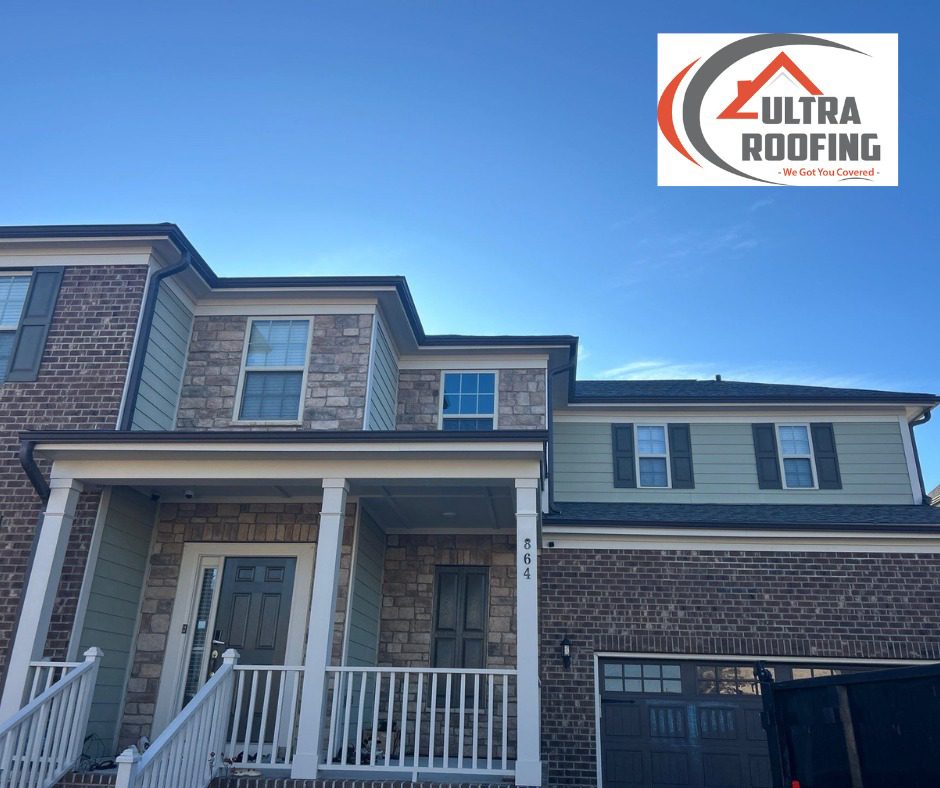 A newly installed light green siding on a residential home by Ultra Roofing in Cary, NC