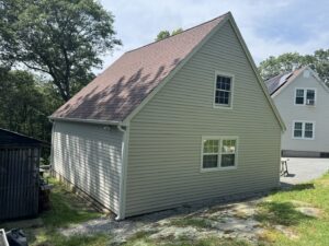 A newly completed siding job on a garage by J&J Rivera Roofing and Supply Co in Old Saybrook, CT