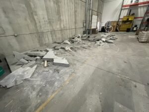 Broken concrete slabs removed from an industrial space by Rick's Demolition and Concrete Removal in Minneapolis, MN
