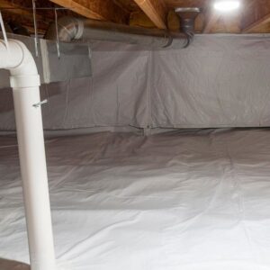 A clean crawl space with a white vapor barrier installed for moisture control by AdvantaClean of Cabarrus and Rowan Counties in Concord, NC.