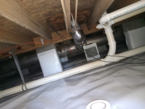 A crawlspace with a full encapsulation and dehumidification system installed by Allied Foundation & Crawlspace Solutions in Decatur, AL.