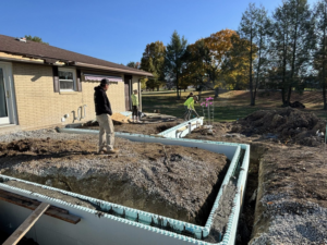 A construction crew installing pool walls and forms for a new pool project by GM Contracting of West Virginia in Morgantown, WV.
