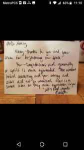 A handwritten customer thank-you note praising window cleaning services from Sheer White Cleaning in Cincinnati, OH.