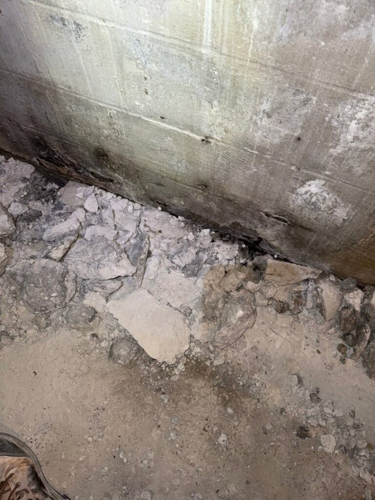 A damaged foundation area showing signs of water intrusion, a common issue addressed by Wetlock Waterproofing in Rock Hill, SC.