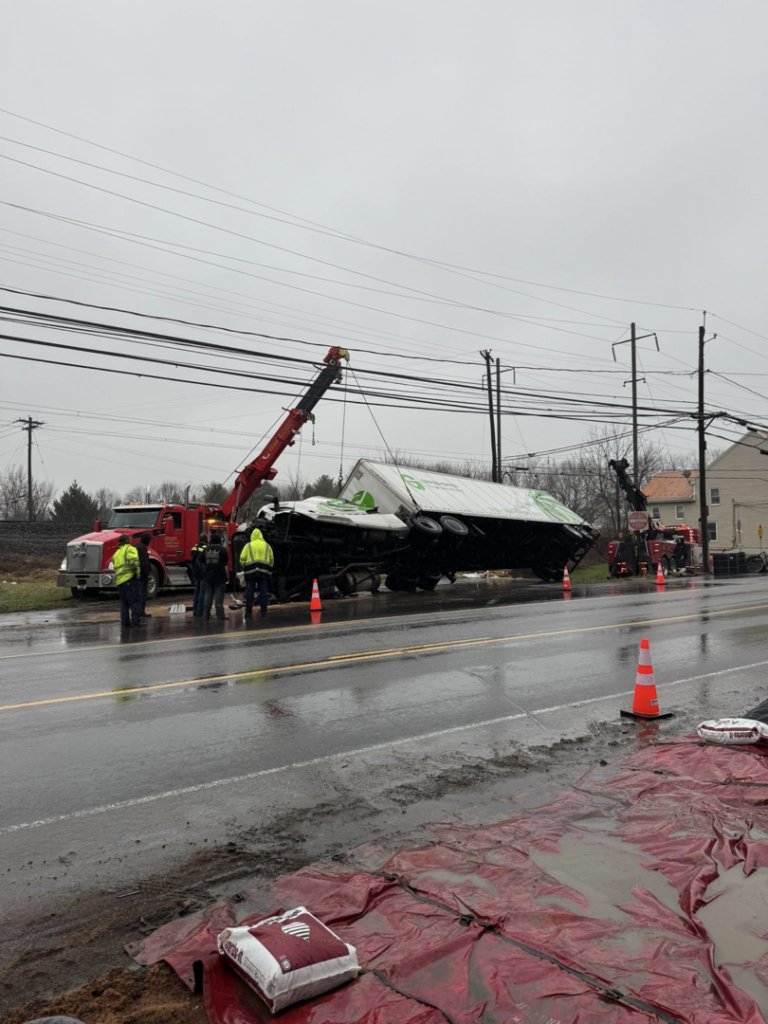 Alliance Towing performing a daytime heavy recovery operation on an overturned trailer in Lancaster, PA.