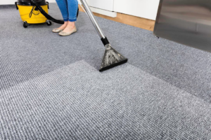 Deep carpet cleaning on a grey floor, showing a clean strip by RJ Cleaning Services in Richmond, KY