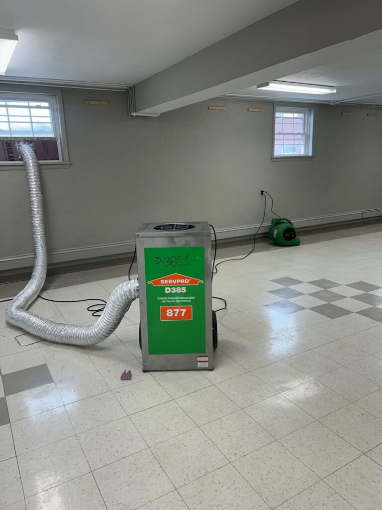 Professional dehumidifier and air mover set up for water damage drying by SERVPRO of Daviess County in Owensboro, KY.