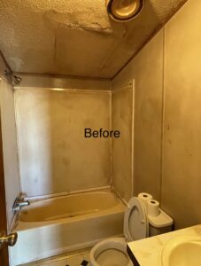 A dirty bathroom with a stained tub and toilet before deep cleaning by Nikki Sue's Cleaning Services in Gillette, WY.