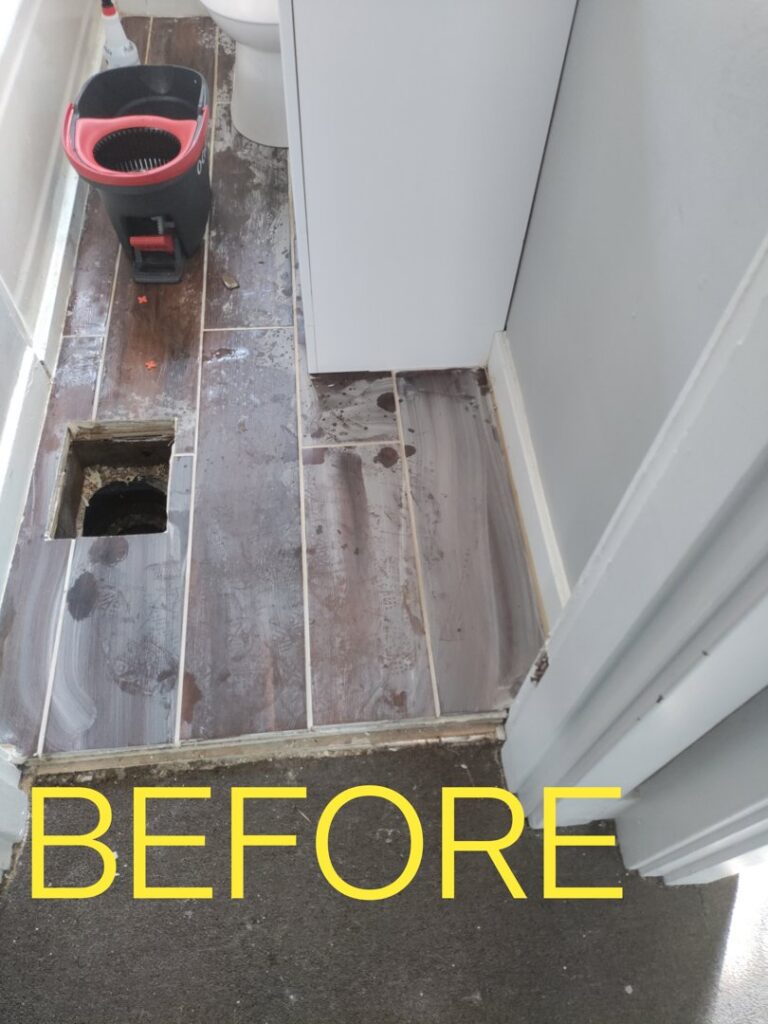A dirty bathroom floor with a mop bucket, marked 'BEFORE' cleaning by Mighty Mess Maid in Elizabethtown, KY.