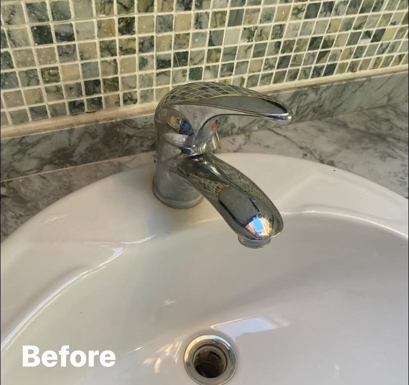 A dirty bathroom sink faucet with water spots and grime before cleaning by Nicy Cleaning Service in Danbury, CT.