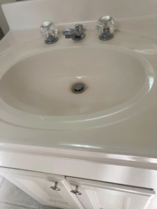 A dirty bathroom sink with visible grime and stains, awaiting cleaning from Awesome Fresh Start Cleaning Service in Baton Rouge, LA.