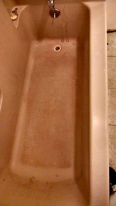 A dirty bathtub showing the need for professional house cleaning from Antioch Professional Cleaning in Manchester, NH.