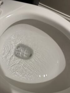 A dirty bathtub with visible grime and hair, ready for a deep clean by J + M Cleaning, LLC in Flint, MI.