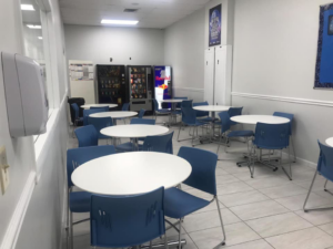 A dirty bathtub and tiled wall before professional cleaning by KPG cleaning care in Fort Lauderdale, FL