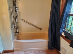 A discolored bathtub with visible grime, indicating a need for professional cleaning by Maids of Hartford in Hartford, CT.