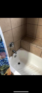 A close-up view of a dirty bathtub before professional cleaning by Klean Living in Lawson, Dallas, TX.