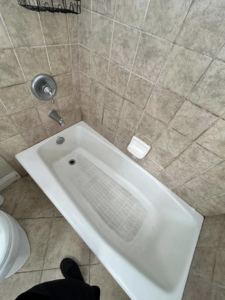 A dirty bathtub with visible residue and grime before professional cleaning by Superior Quality Cleaners in Sacramento, CA