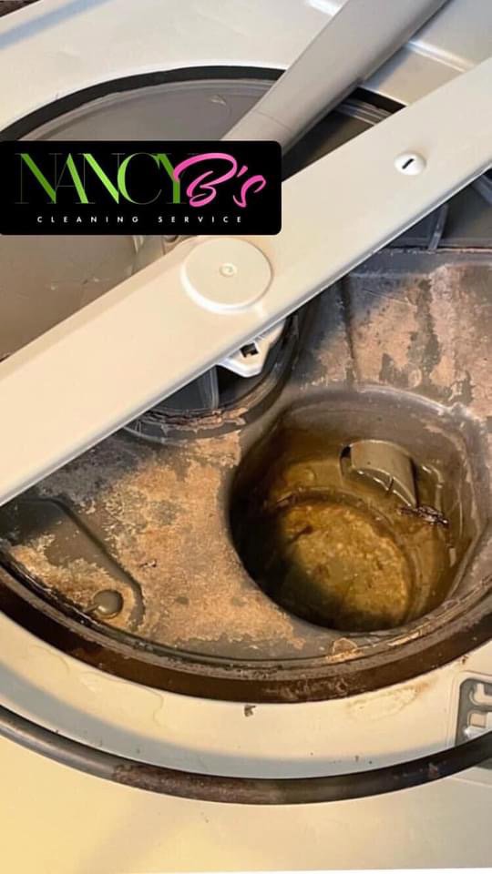 A dirty dishwasher filter and drain area before deep cleaning by Nancy B's Cleaning Service LLC in Atlanta, GA.