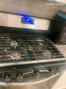 A dirty gas stovetop covered in food splatters, ready for a thorough cleaning by Royal Madam Cleaning LLC in Charlotte, NC.