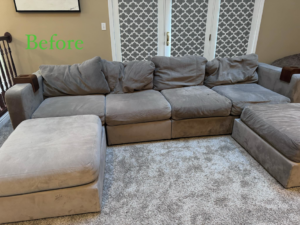 A dirty gray sectional sofa before professional cleaning by J&J clean services in Pittsburgh, PA.