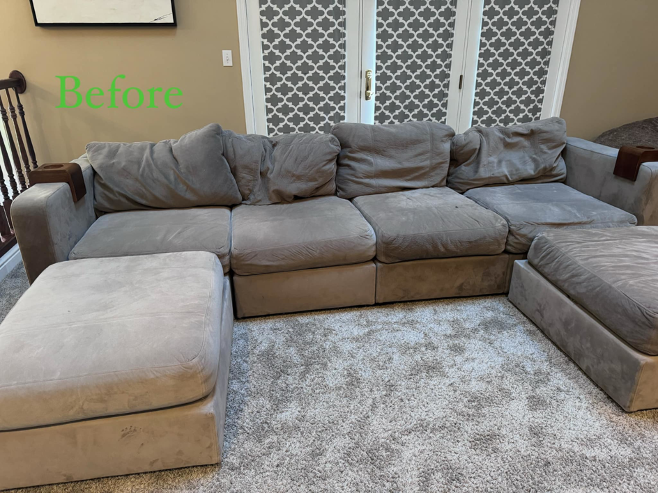 A dirty gray sectional sofa before professional cleaning by J&J clean services in Pittsburgh, PA.
