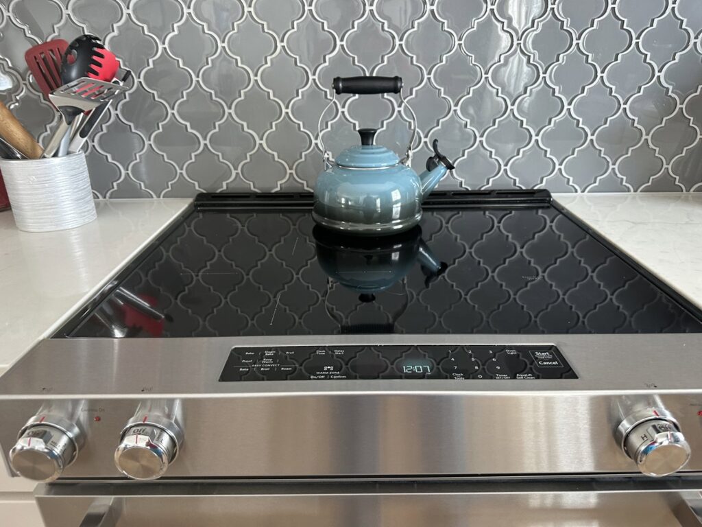 A dirty kitchen countertop with crumbs and spills, indicating a need for cleaning by J + M Cleaning, LLC in Flint, MI.