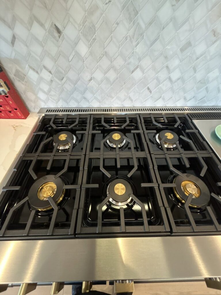 A dirty oven vent area with dust and grime, indicating a need for deep cleaning by JG Clean Solutions in Henderson, NV.