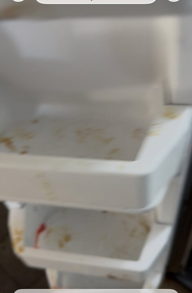 Very dirty refrigerator shelves and drawers, showing a before-cleaning state for Bee-Dazzled Cleaning Service in Long Beach, CA.