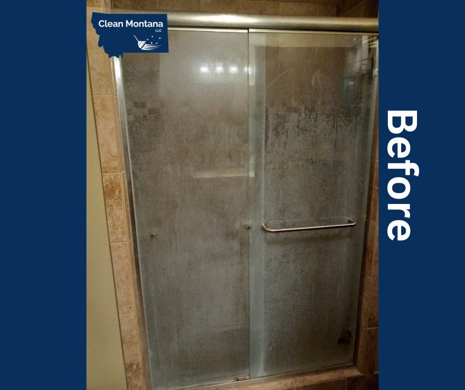 A dirty shower with grimy glass doors and tiled walls before professional cleaning by Clean Montana, LLC in Missoula, MT.