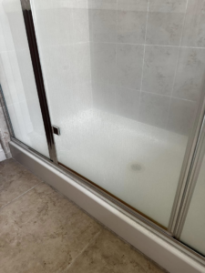 A dirty shower stall before professional house cleaning by A.M.L Janitorial Services LLC in Sparks, NV.