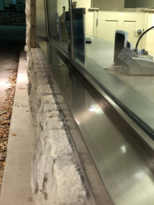 A dirty window sill and counter before professional cleaning by Ascent Cleaning Solutions, LLC in Nashville, TN