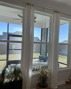 Dirty windows in a sunroom, ready for professional cleaning by Inspire Clean OKC in Oklahoma City, OK.