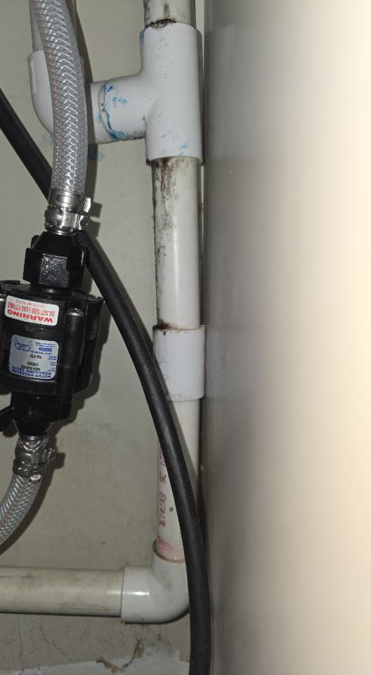 Discolored plumbing pipes showing signs of potential water damage or moisture issues, serviced by ABS Restoration Services, Inc. in North Little Rock, AR