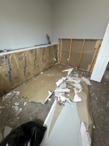 Drywall removed from lower walls for water damage remediation by 406 Disaster Response in Billings, MT.