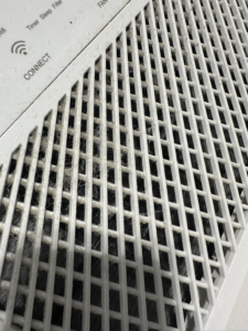 A dusty air vent grille before professional cleaning by Lake Area Cleaning Services in Lake Charles, LA
