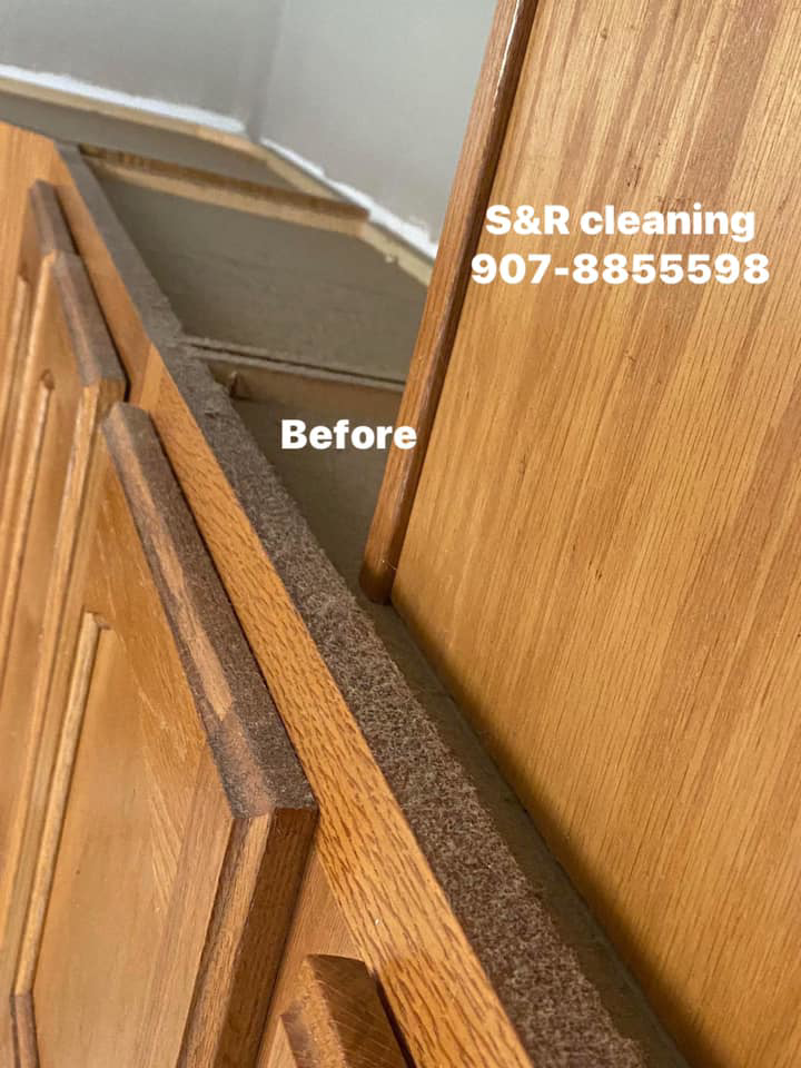 Dusty wooden kitchen cabinets before a thorough cleaning service by S&R Services LLC in Anchorage, AK.