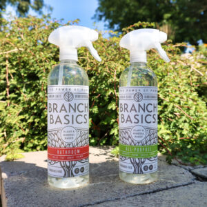 Two bottles of eco-friendly Branch Basics cleaning products, used by Natural Clean in Sioux Falls, SD.