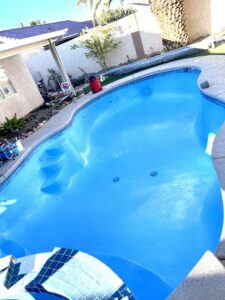 An empty residential pool after a thorough cleaning and maintenance service by Overflow Poolz LLC in Las Vegas, NV.
