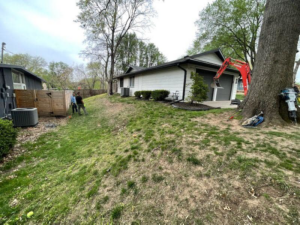 Excavation work with an excavator and tools for foundation repair by Arrow Foundation Repair in Shawnee, KS.