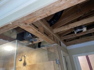 An exposed bathroom ceiling during water damage remediation by Quality Remediation llc in Everett, WA