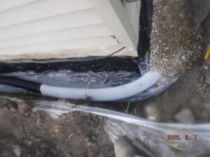 Exterior foundation with drainage pipe and waterproofing membrane installed by Waterdry Indiana in South Bend, IN