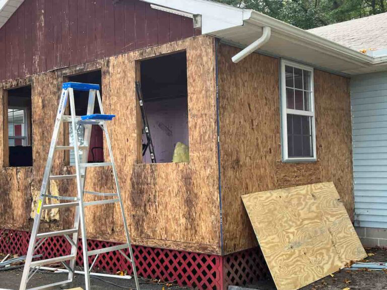Exterior plywood sheathing damaged by water being repaired by EG Painting & Carpentry Inc in Seaford, DE.