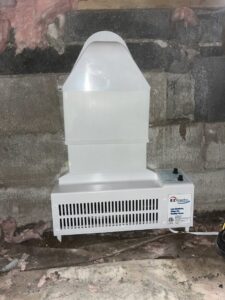An EZ Breathe ventilation system installed on a concrete block wall by EverDry Toledo in Toledo, OH.