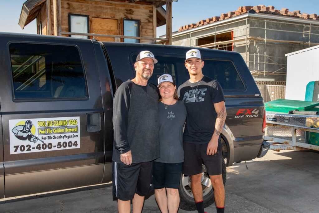 The family team of Pool Tile Cleaning Vegas standing proudly in front of their service truck in Las Vegas, NV.