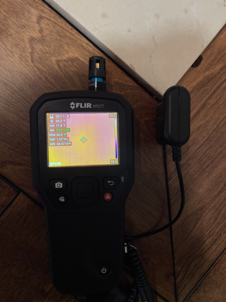 A FLIR MR277 thermal imaging camera used for moisture detection and water damage assessment by Healthy Interior Solutions in Fishers, IN.